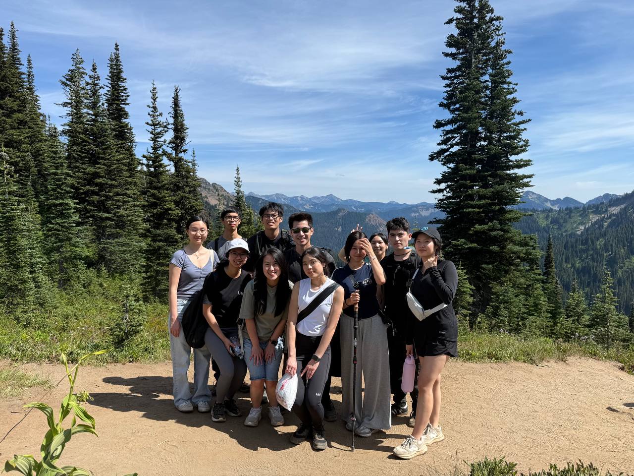 KAWAN friends gathered along a mountain hiking trail